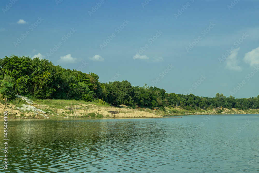 Natural green and blue sky view of the small river of Bangladesh