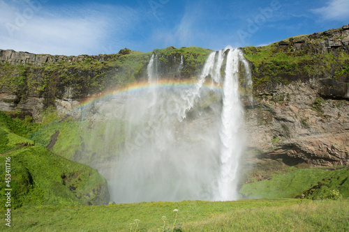 Seljalandsfoss waterfall with a rainbow, Iceland