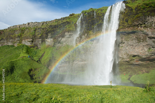 Seljalandsfoss waterfall with a rainbow  Iceland