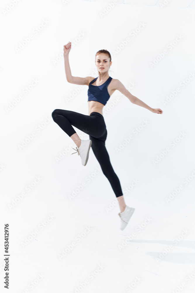 Obraz premium active sports woman jumping workout fitness exercise