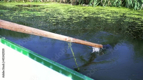 Boat movement and rowing on the river. in summer  