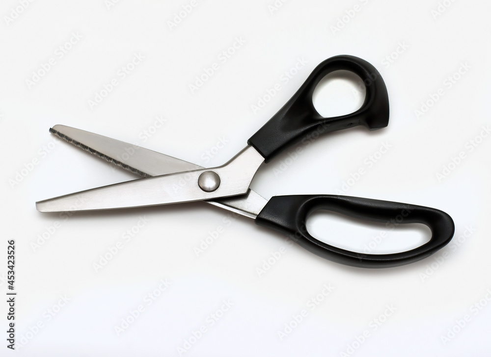 Sewing scissors close up isolated on white background Sewing scissors close up isolated on white background