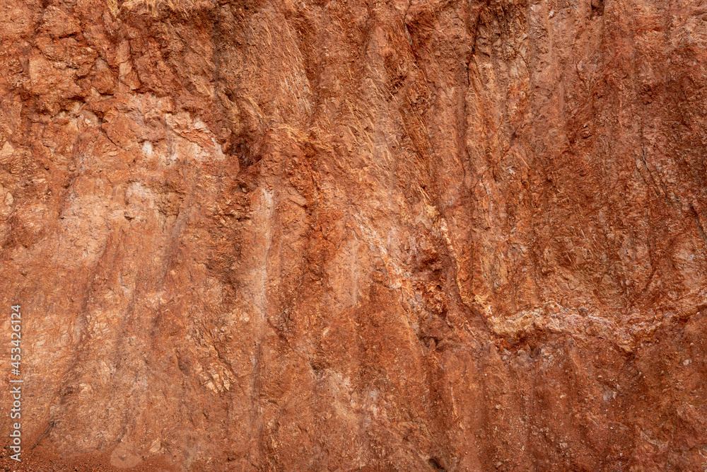 The red soil surface is scratched The red soil surface is scratched
