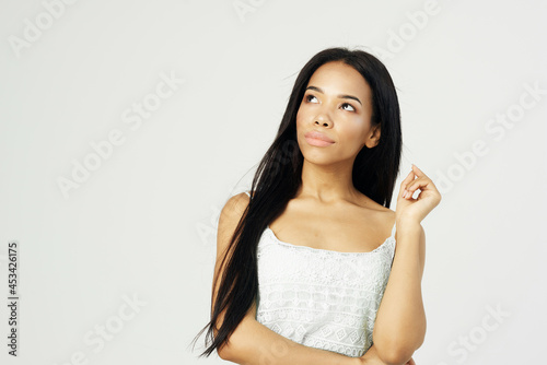 cute african american woman in white tank top fashion hairstyle cosmetics studio