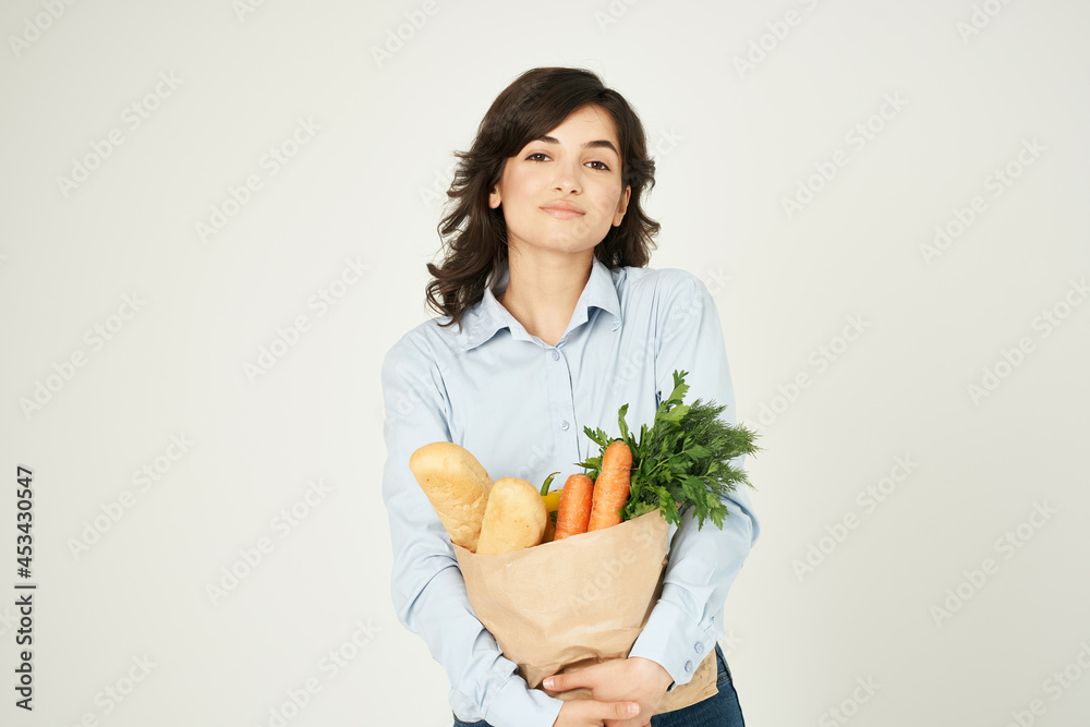 woman in blue shirt pack with groceries diet food shopping health woman in blue shirt pack with groceries diet food shopping health