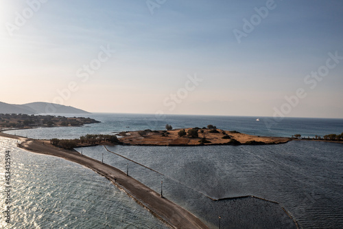 panoramic view of the old stone mills  bridge  road and sea filmed from a drone 