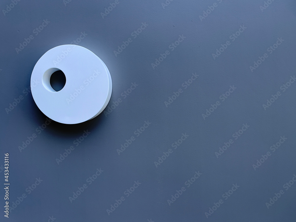 Cement wall with Grey color background and white circle decoration. DIY (Do It Yourself) ideas for modern room interior, exterior and outdoor decorations. Selective focus with copy space Cement wall with Grey color background and white circle decoration. DIY (Do It Yourself) ideas for modern room interior, exterior and outdoor decorations. Selective focus with copy space