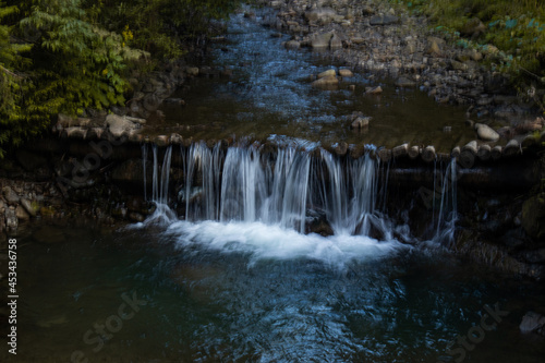 waterfall in the mountains © Belokon