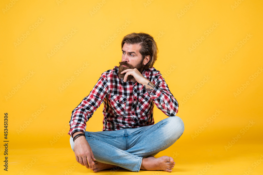 serious handsome bearded guy with unshaven face and stylish hairdo wear casual clothes, barber shop serious handsome bearded guy with unshaven face and stylish hairdo wear casual clothes, barber shop