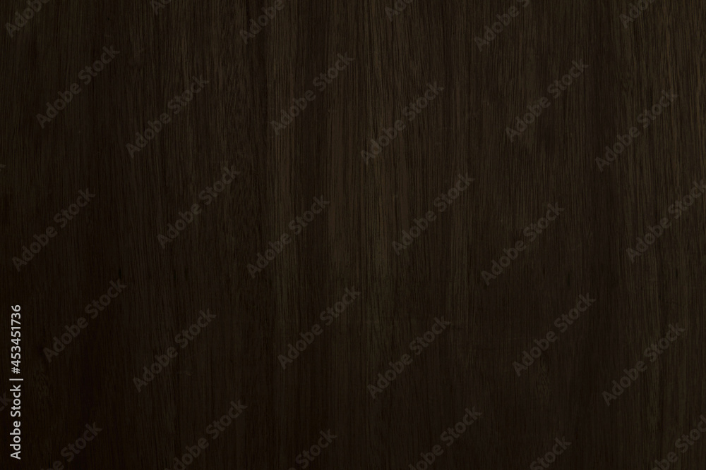 Dark brown plywood with broken pattern on surface for texture and background Dark brown plywood with broken pattern on surface for texture and background
