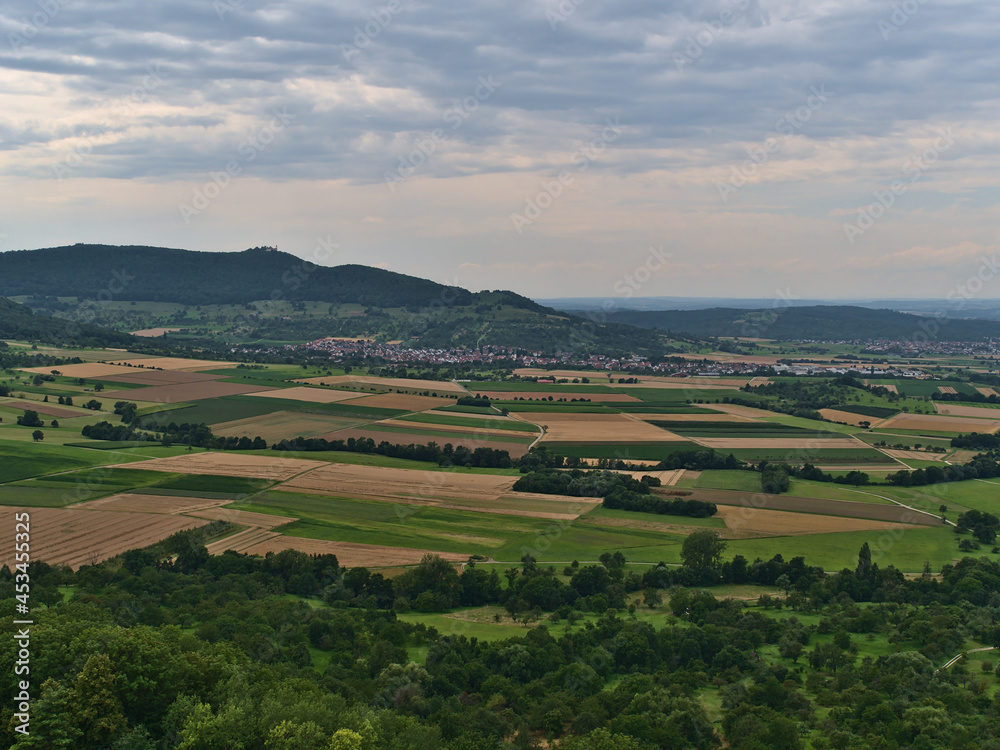 Beautiful aerial view over the foothills of northern Swabian Alb from Limburg hill near Weilheim an der Teck, Germany with village Bissingen.
