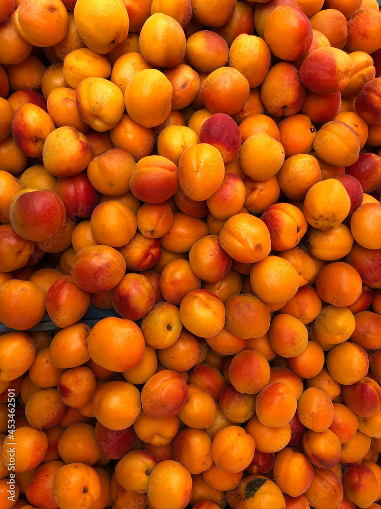 Pile of fresh apricots at the farmers market
