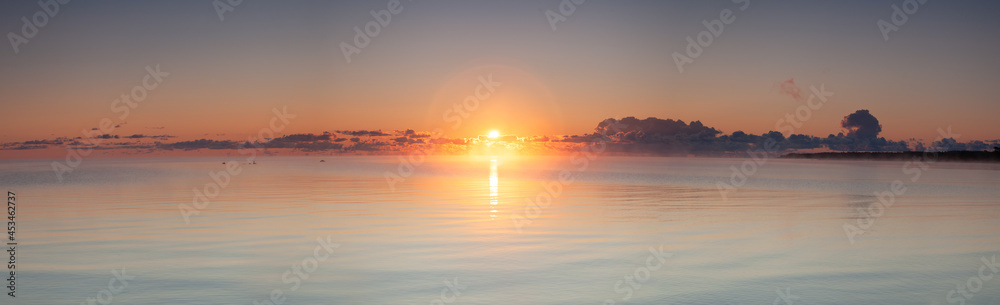 Panorama over the Baltic Sea horizon during sunrise. Panorama over the Baltic Sea horizon during sunrise.