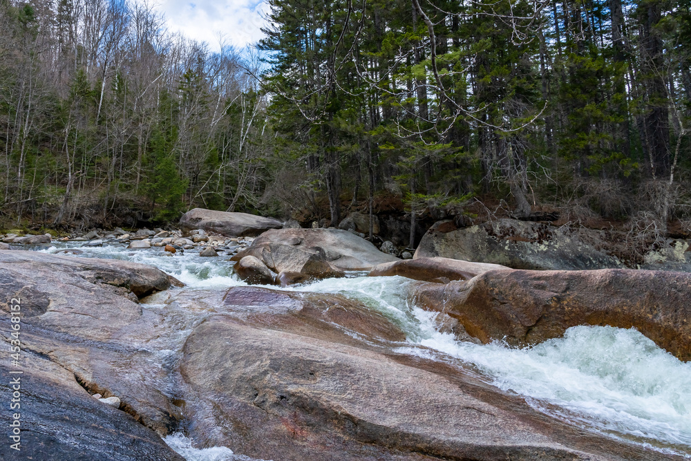 Smooth boulders cut by ancient glaciers in the bed of the Pemigewasset river