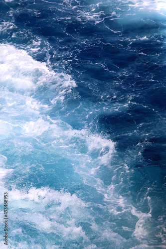 Sea foam and deep blue sea. Selective focus. © jelena990