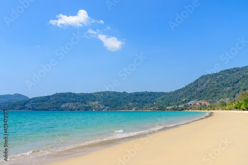 Patong Beach with crystal clear water and wave, the most famous tourist destination, Phuket, Thailand © wirojsid