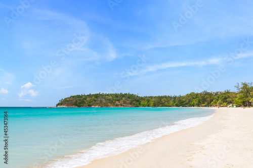 Kata Beach with crystal clear water and wave, famous tourist destination and resort area, Phuket, Thailand © wirojsid