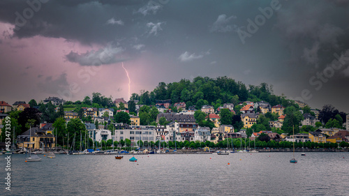 Thunderstorm coming over a city on the lake