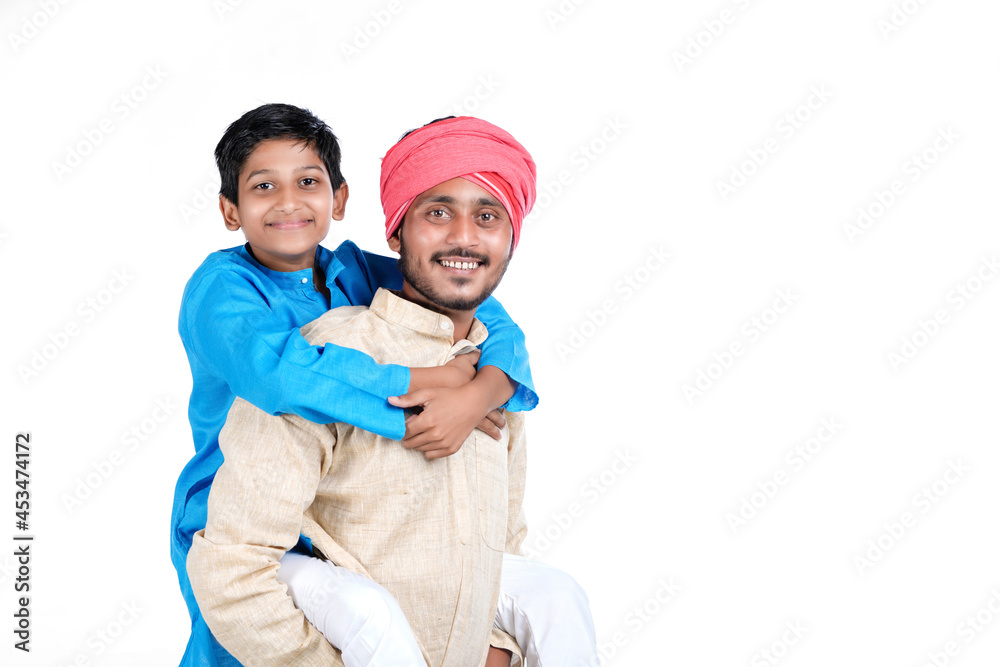 Indian farmer with his child on white background Indian farmer with his child on white background