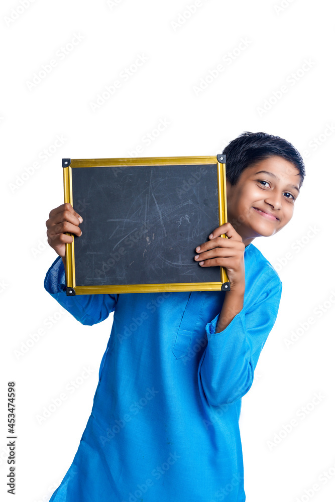 boy at blank chalkboard