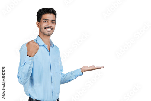 Young indian man showing expression on white background