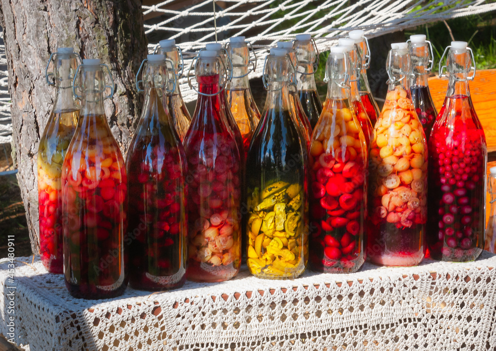 Preserves and tinctures in the sun  - obrazy, fototapety, plakaty 