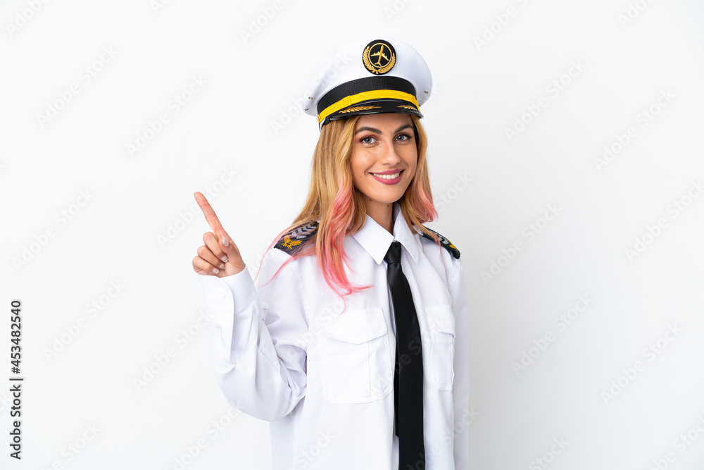 Airplane pilot over isolated white background showing and lifting a finger in sign of the best Airplane pilot over isolated white background showing and lifting a finger in sign of the best