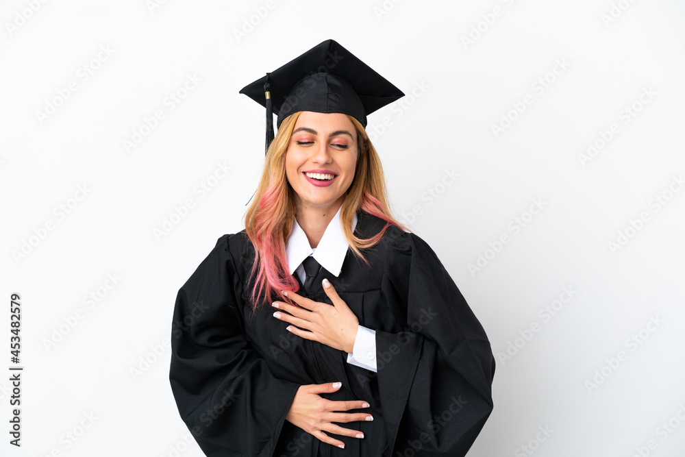 Young university graduate over isolated white background smiling a lot Young university graduate over isolated white background smiling a lot