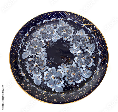 Obraz na plátne Round porcelain platter painted under Gzhel with traditional pattern, on white b