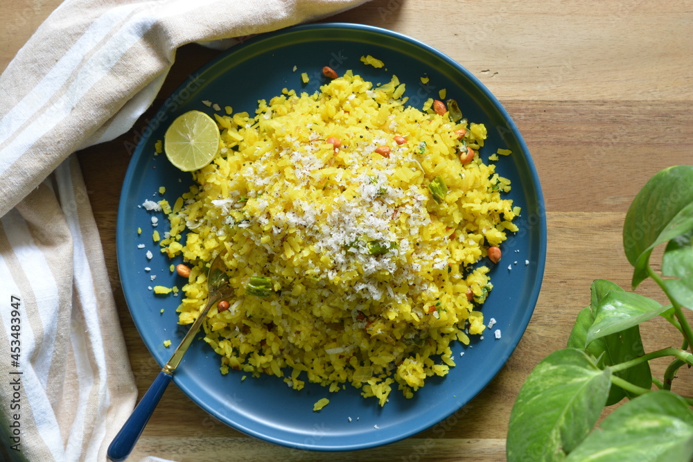 poha, an Indian spicy cuisine Stock Photo Adobe Stock