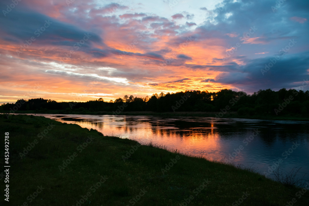 Lower Narew Valley, sunset on the Narew River, Łomża, Poland