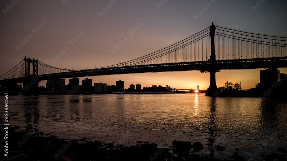 Fototapeta premium Sunrise reflection and bridge in New York Harbor