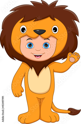 boy wearing lion costume waving