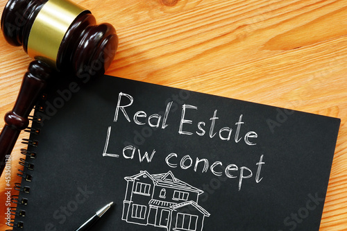 Real Estate Law concept is shown on the business photo using the text