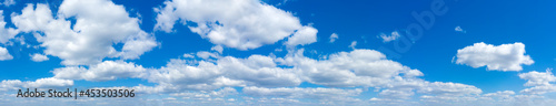 Blue Sky background with tiny Clouds. Panorama background