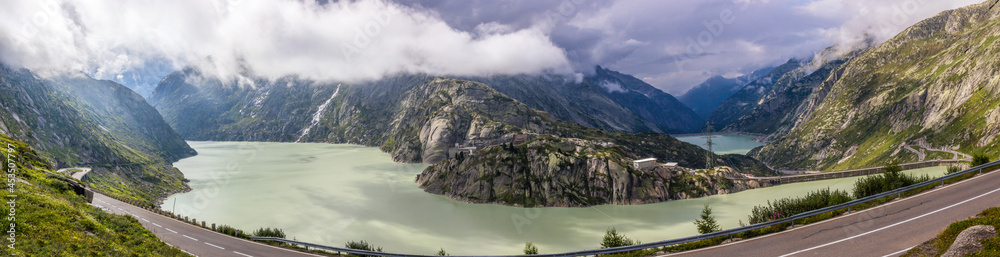 clouds over Grimsel Pass and lake in Switzerland