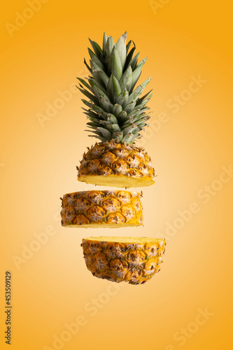 Sliced pineapple Yellow isolated. Fall rings of Healthy tropical fruit eating. Minimal summer fruit concept. Creative pineapple layout.