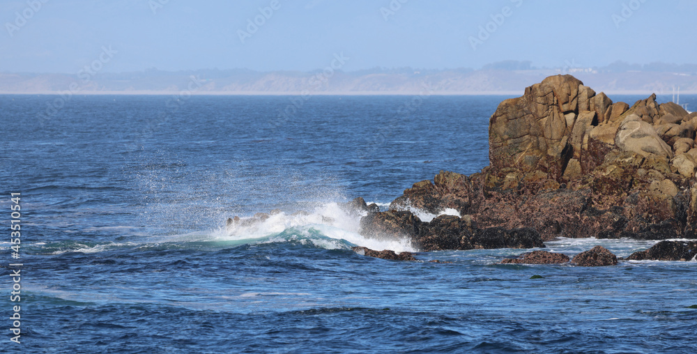 waves crashing on rocks