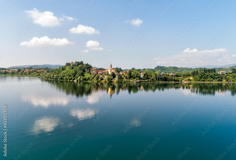 Landscape of Lake Varese with view to the church of San Lorenzo of Biandronno, Italy