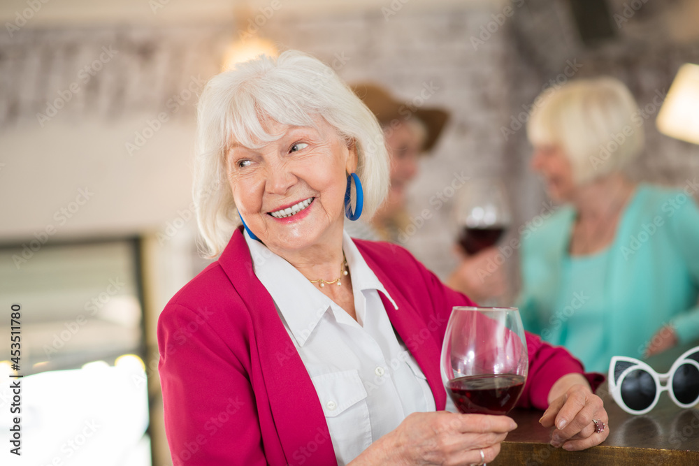 Senior blonde ladies with celebrating birthday and feeling amazing Senior blonde ladies with celebrating birthday and feeling amazing