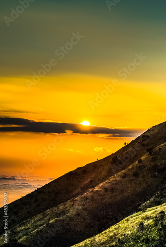 sunset in the mountains ,location on mount Merbabu , Magelang,Centra Java,Indonesia