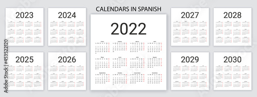 Spanish Calendar 2022  2023  2024  2025  2026  2027  2028  2029  2030 years. Vector. Week starts Monday. Spain calender template. Desk organizer. Yearly grid on white. Simple illustration.