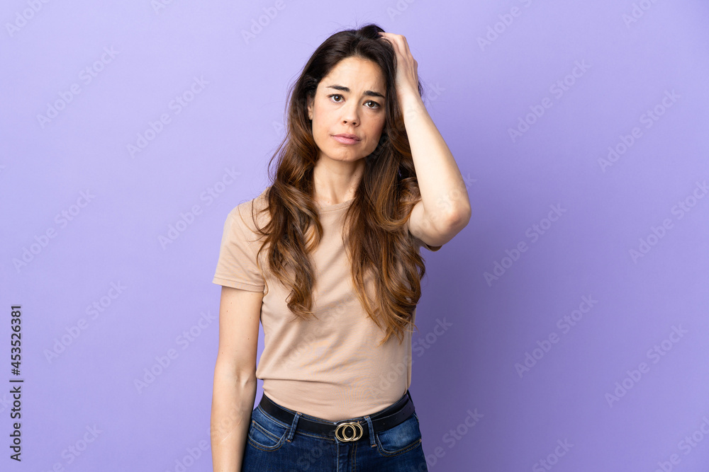 Woman over isolated purple background with an expression of frustration and not understanding Woman over isolated purple background with an expression of frustration and not understanding
