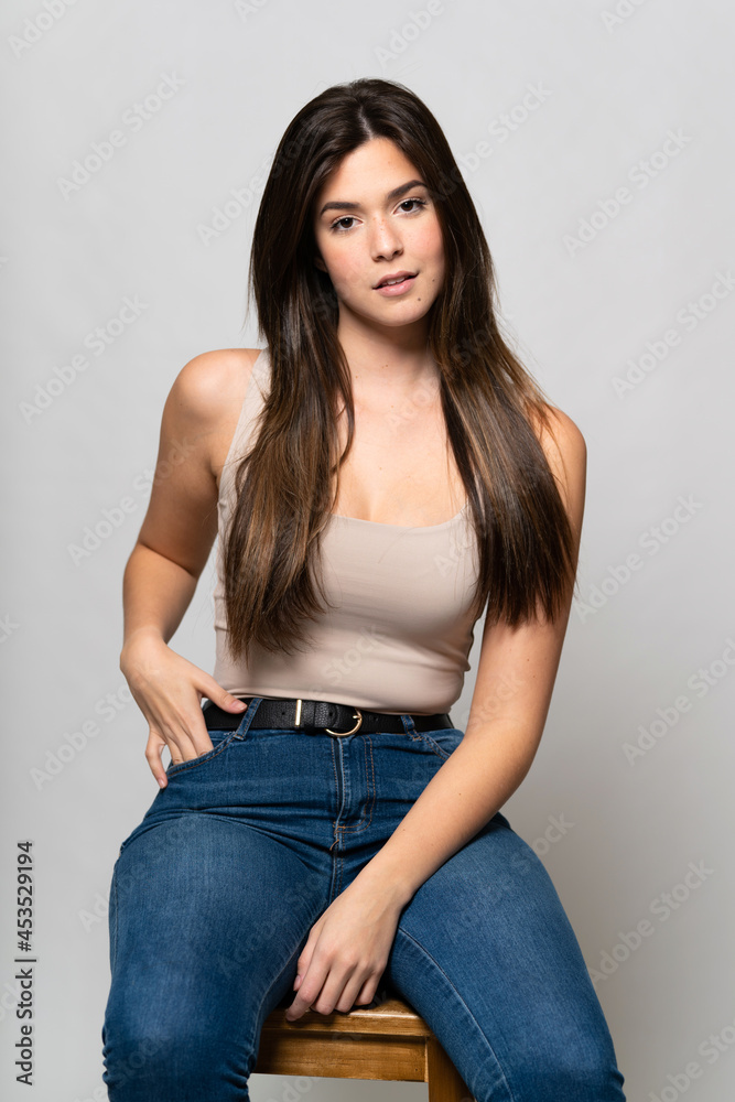 Teenager Brazilian girl over isolated background