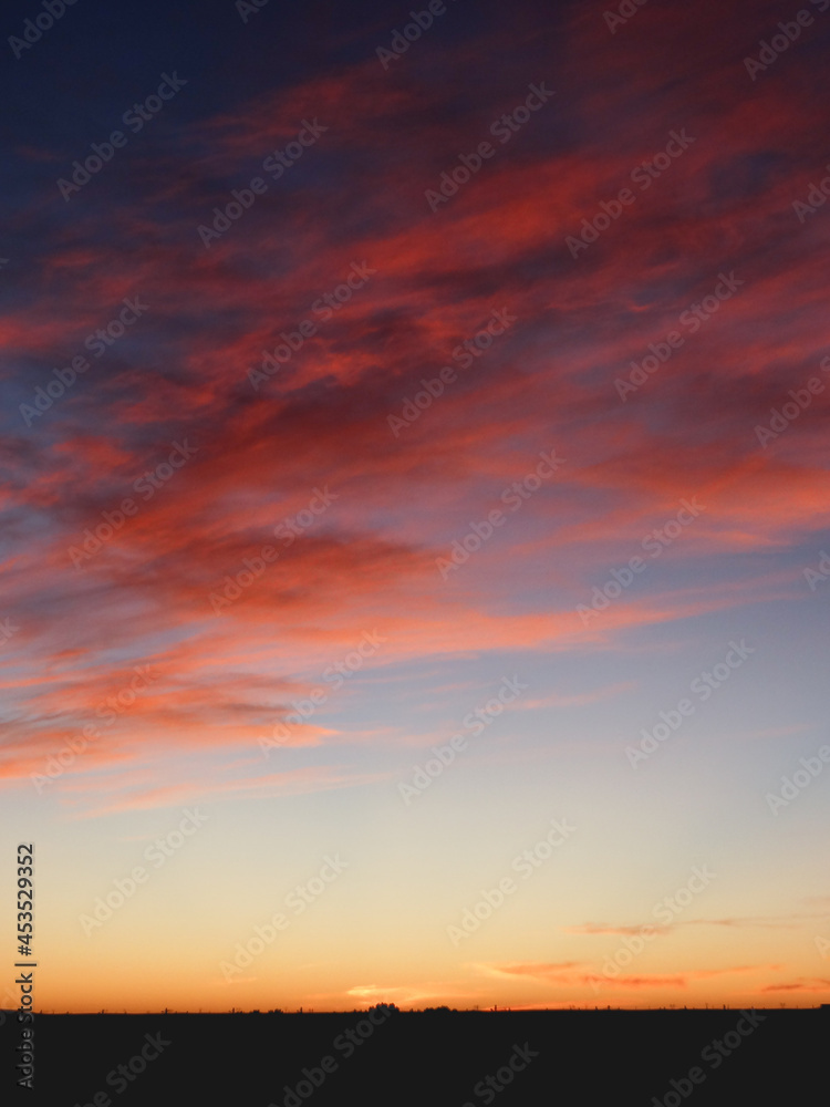 red sunset sky in algeria naama