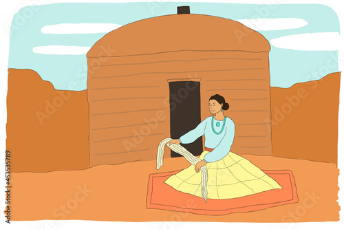 woman sorting wool outside of hogan