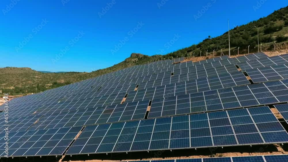 Aerial view of solar power station. Aerial Top View Of Solar Farm With Sunlight. Renewable energy. Aerial view of Solar Power Station.