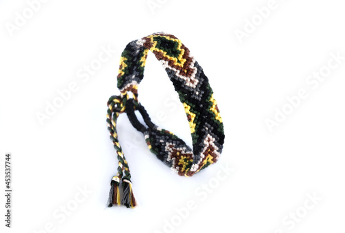 DIY woven tied friendship bracelet with unusual braiding. Summer accessory