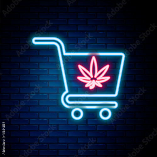 Glowing neon line Shopping cart with marijuana or cannabis leaf icon isolated on brick wall background. Online buying. Delivery service. Supermarket basket. Colorful outline concept. Vector