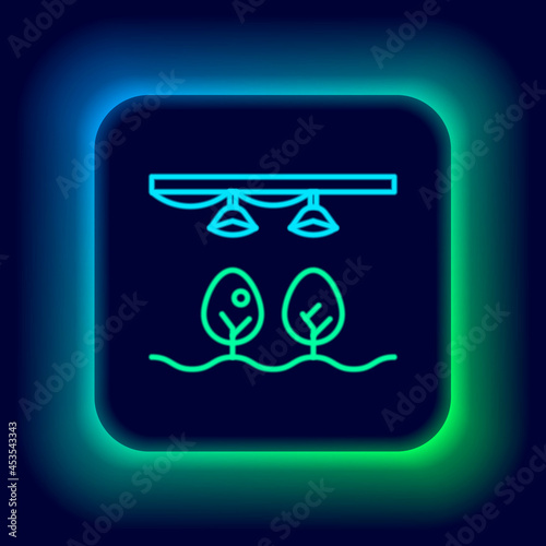 Glowing neon line Smart farm with light bulb and plant symbol icon isolated on black background. Colorful outline concept. Vector